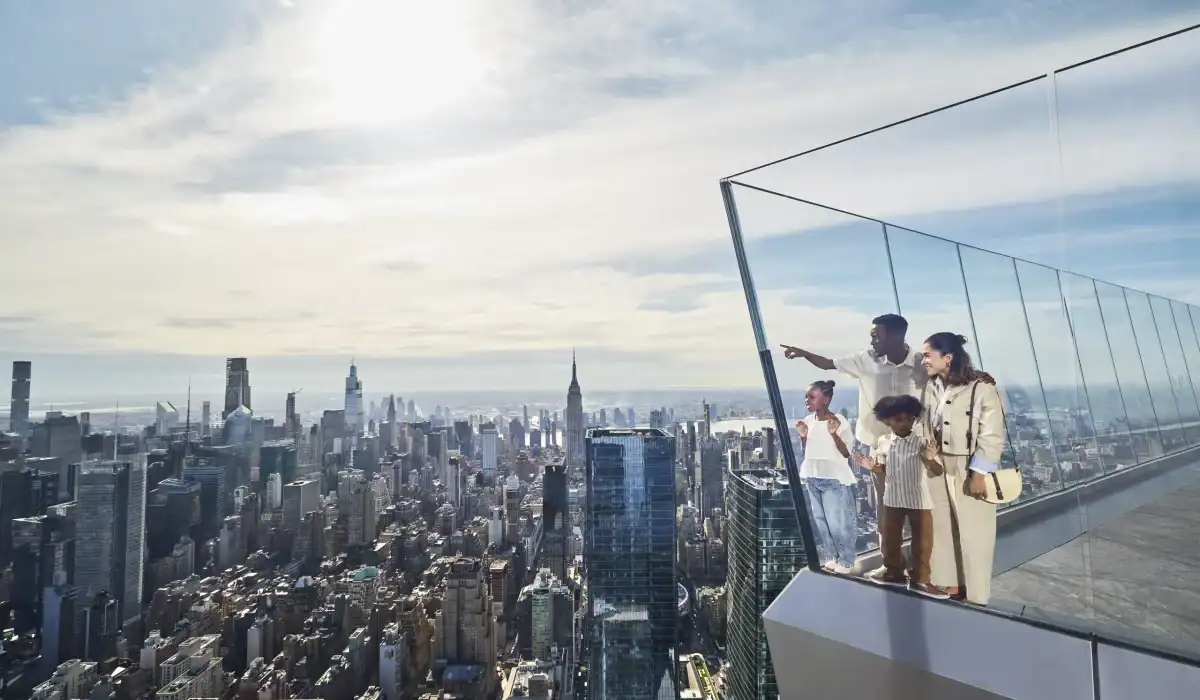 family looking at the nyc skyline from the edge nyc