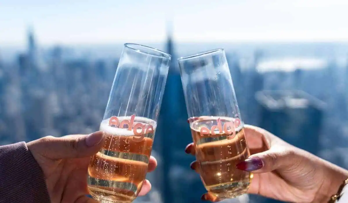 to hands cheering with the edge nyc glasses