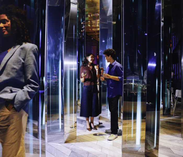 Visitors enjoying the immersive experience at Edge NYC in Hudson Yards.